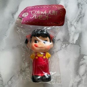 Vintage Peko-chan sofubi squeaker figure. ASIS